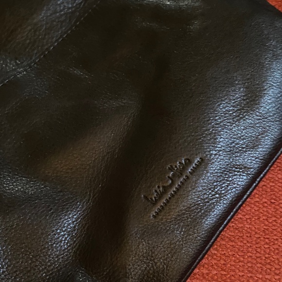 India Hicks Carmen fold over Black Leather Clutch with tassel - Picture 8 of 8